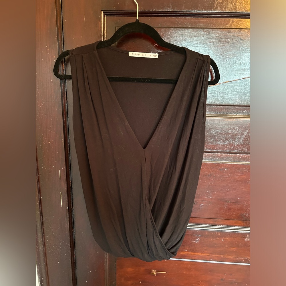 Sleeveless black blouse